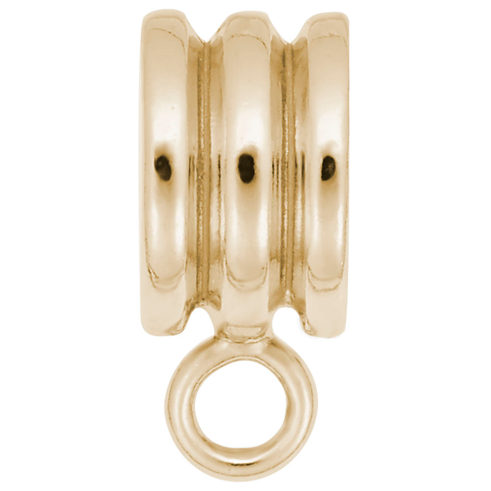 Gold ribbed charmdrop on a white background
