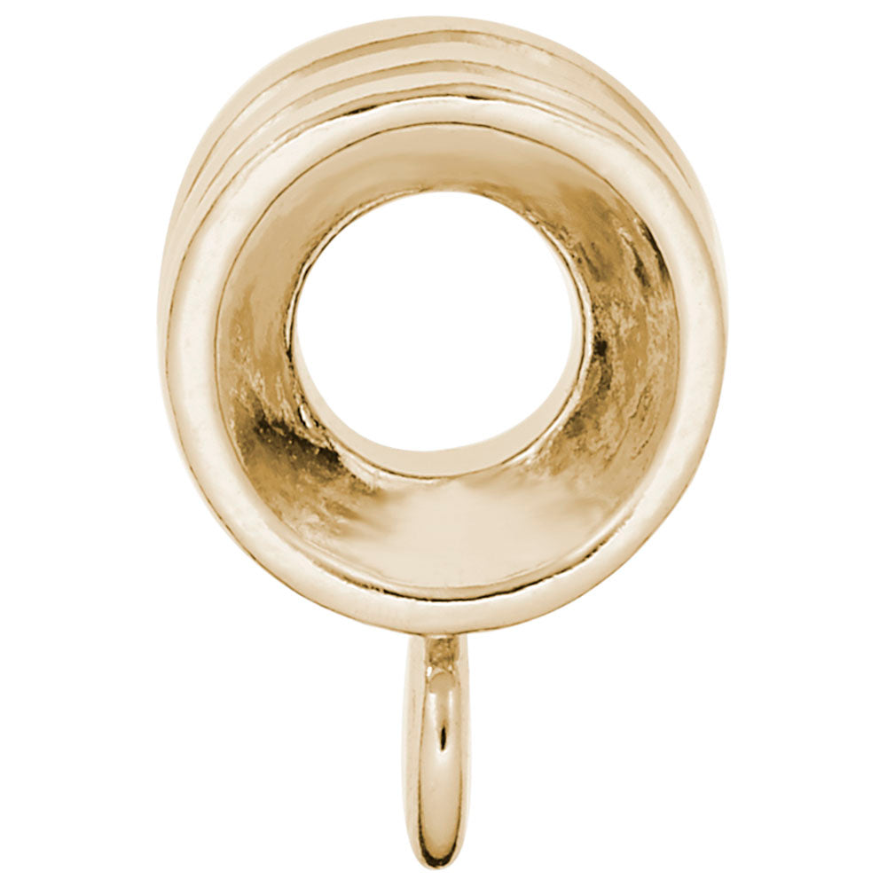 Side view of a Gold ribbed charmdrop on a white background