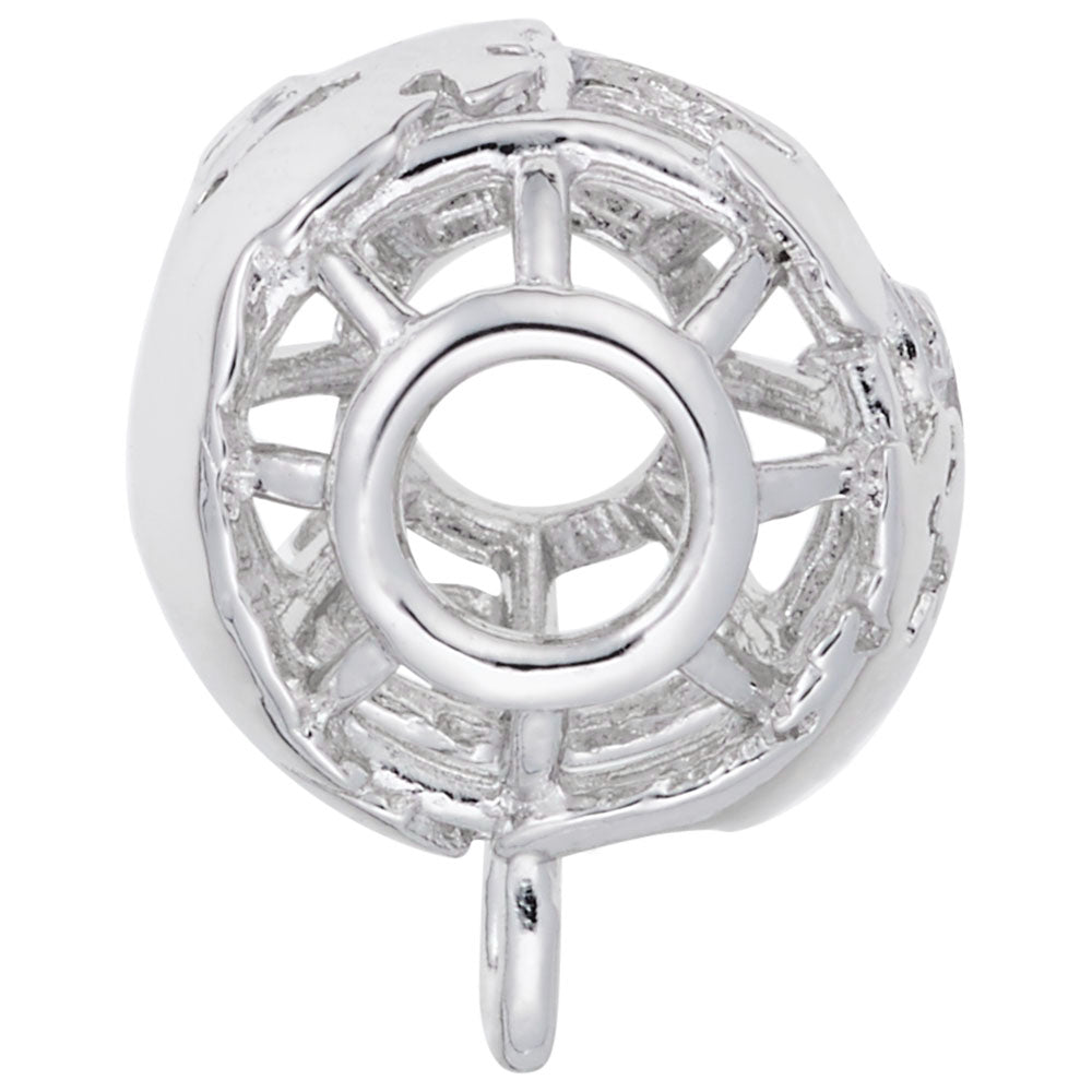 Side view of a Silver Globe charmdrop on a white background