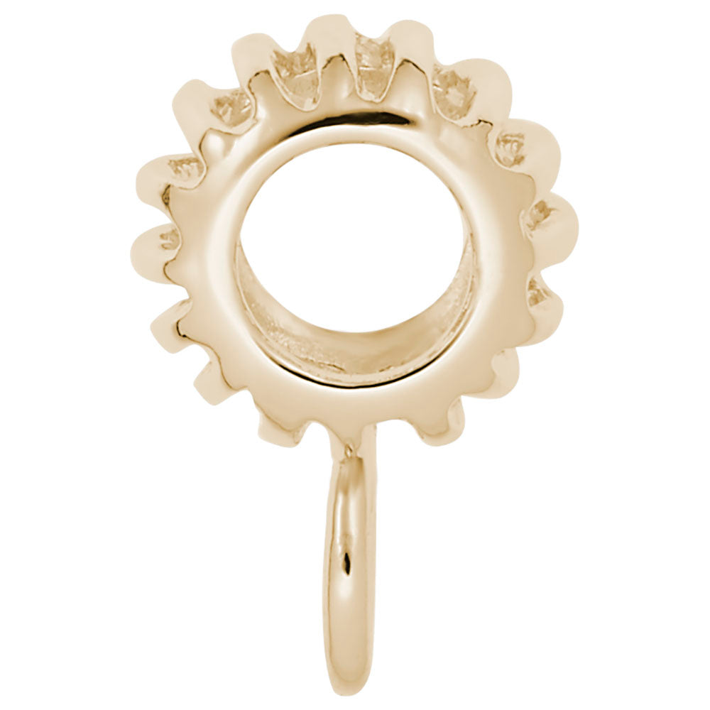 Side view of a Gold treaded charmdrop on a white background