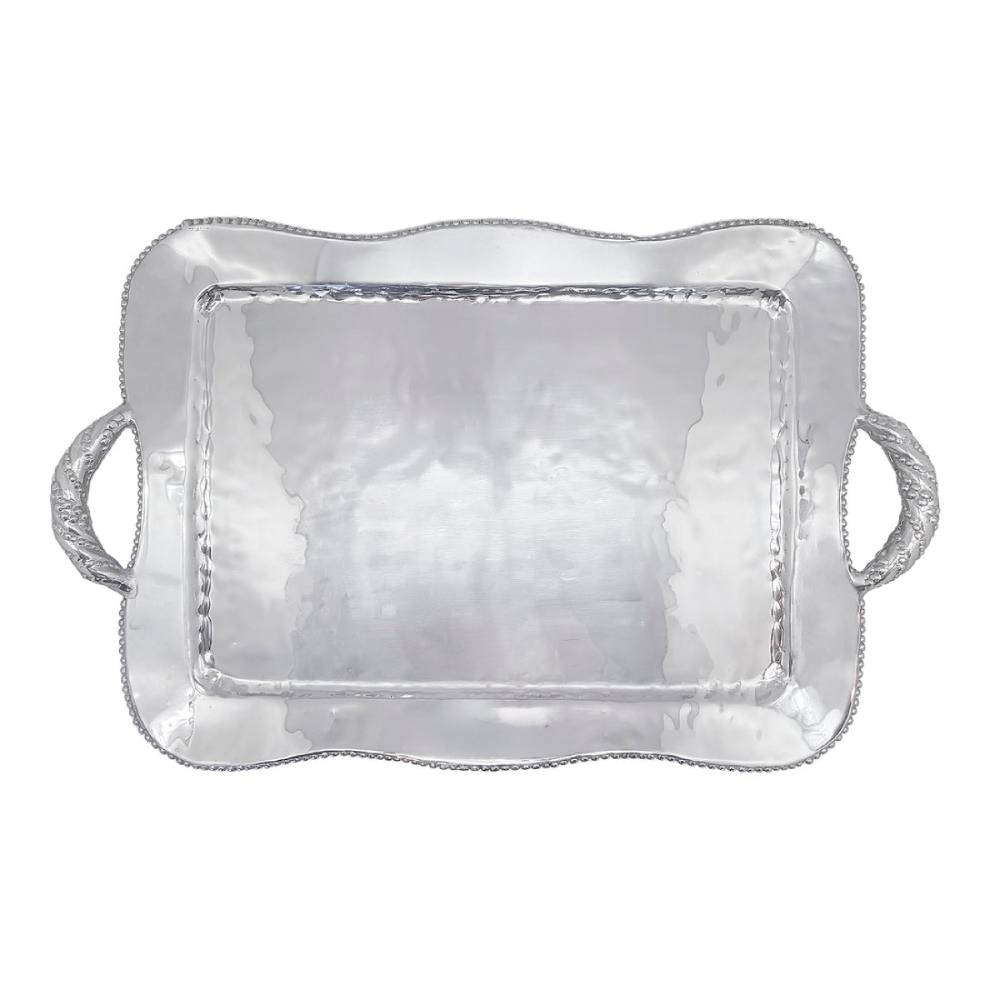 A rectangular silver serving tray with a hammered finish, scalloped edges, and two loop handles on the sides, shown against a plain white background.