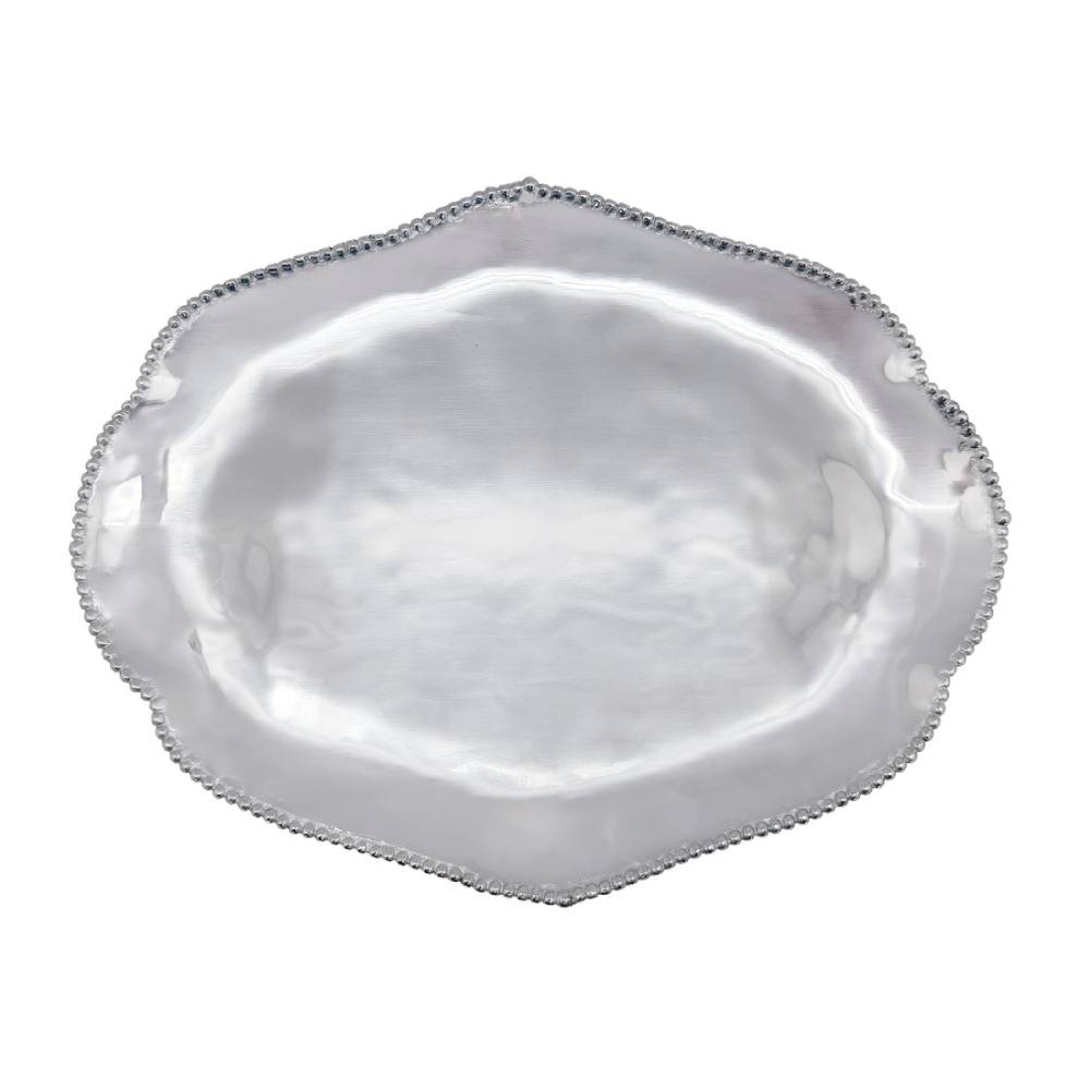 Decorative silver tray with a textured rim on a white background