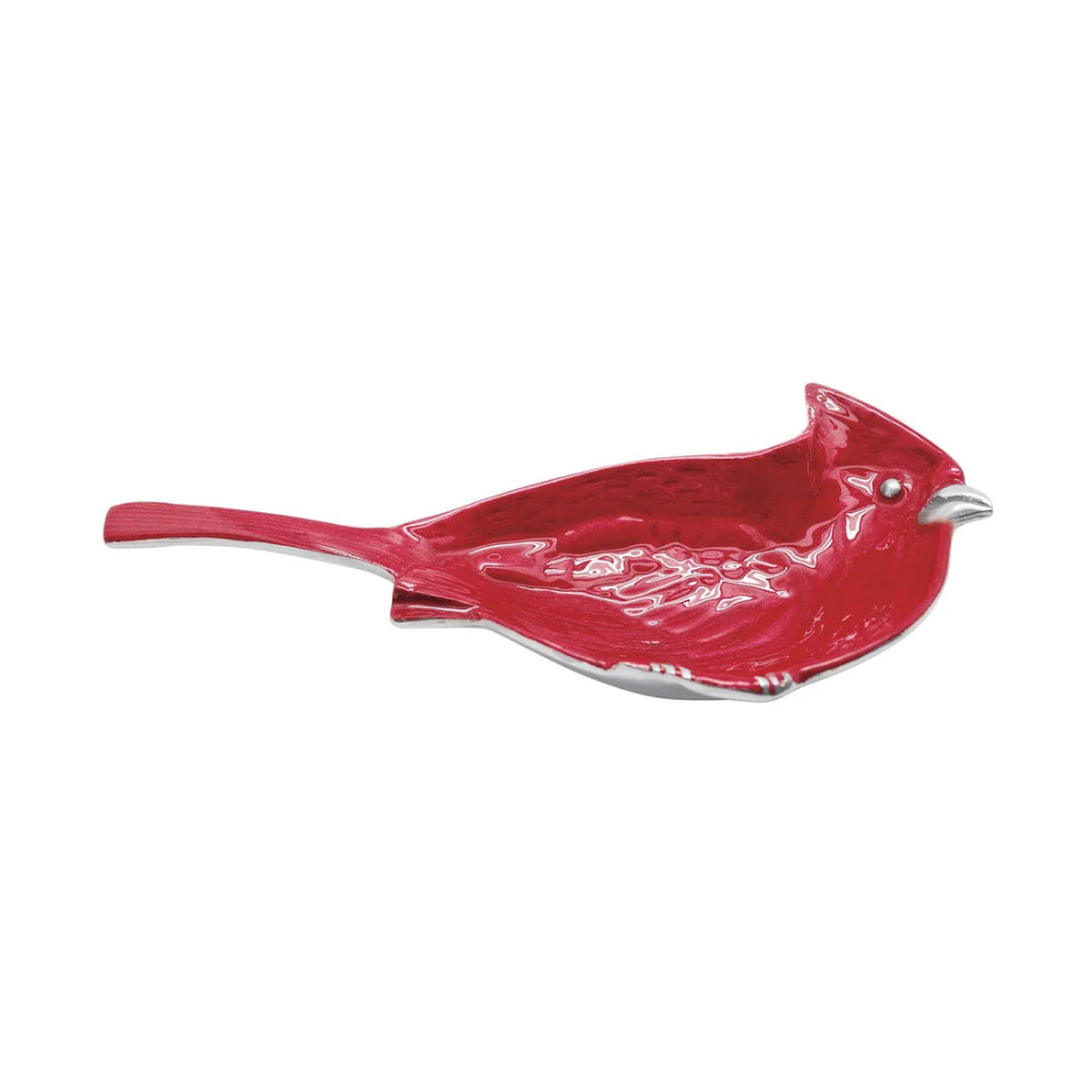 Red cardinal nut dish on a white backround. 