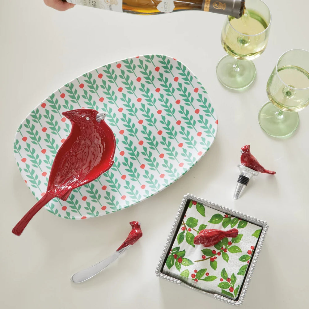 Red cardinal nut dish and other cardinal themed items on a white backround.
