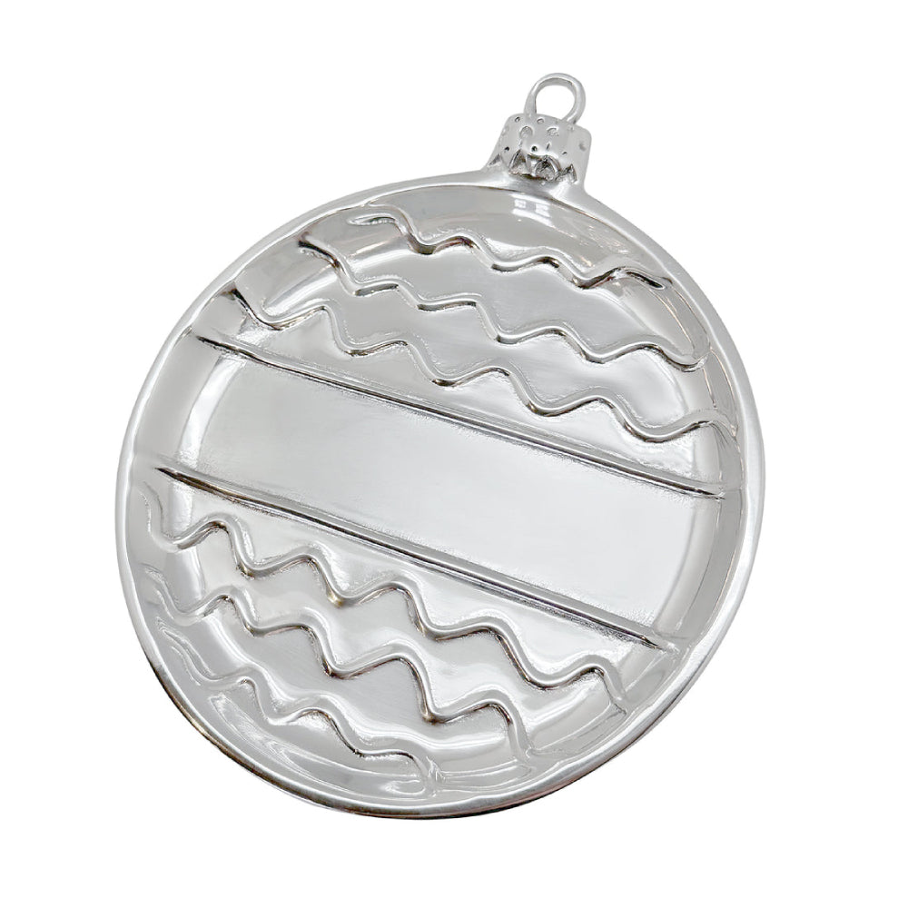 Silver engravable ornament designed plate on a white background
