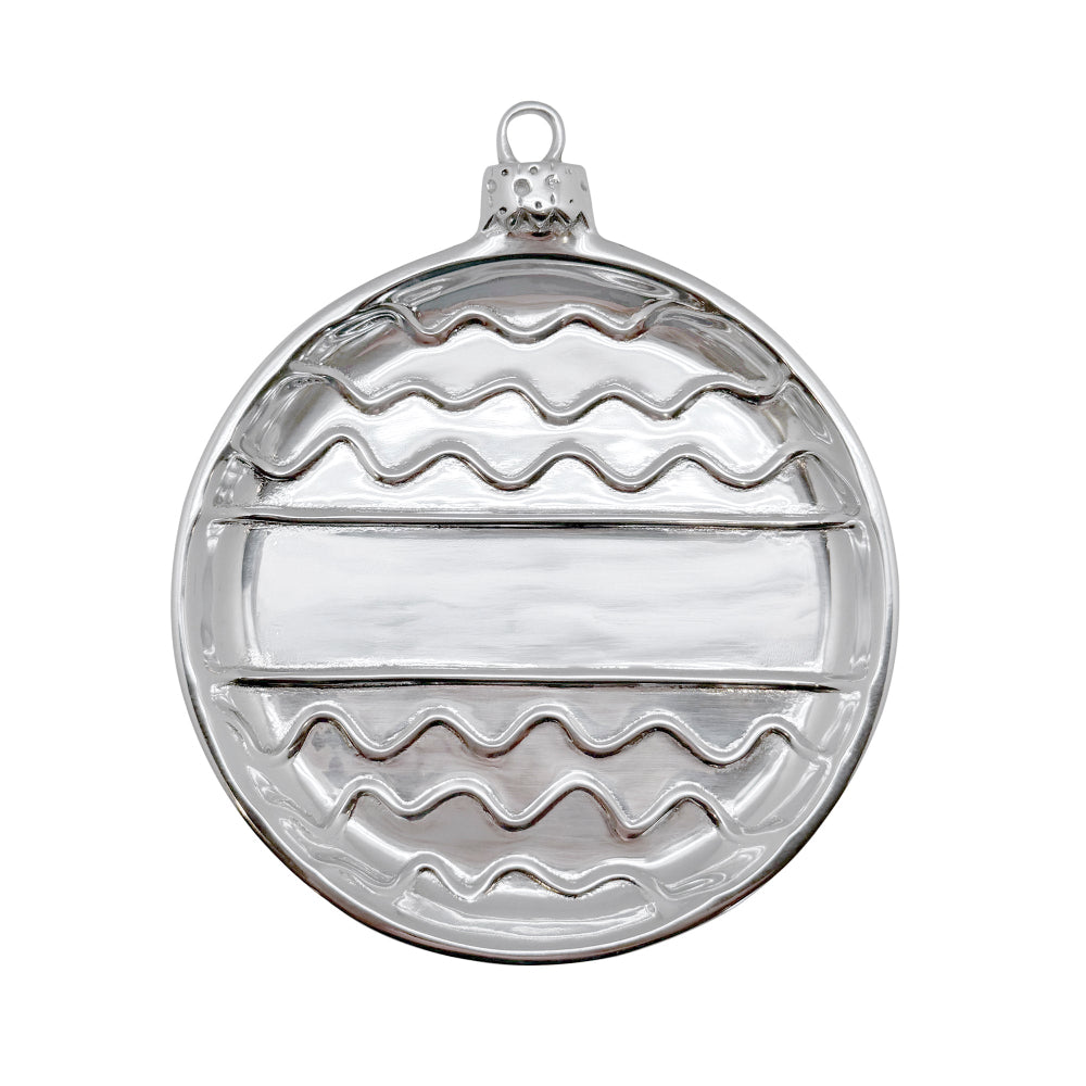 Silver engravable ornament designed plate on a white background