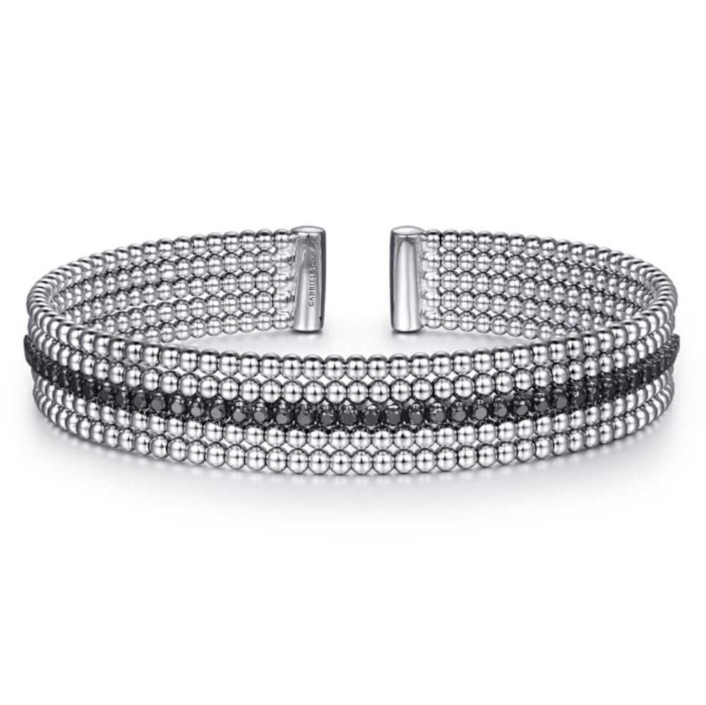 Multi-layered bracelet with beads on a white background