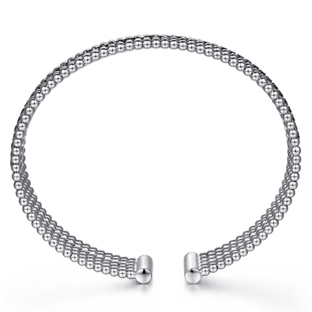 Silver beaded necklace on a white background