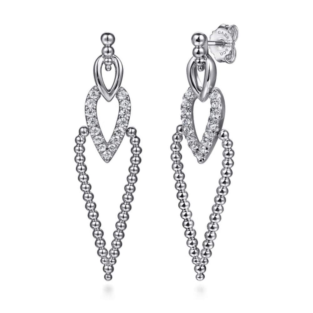 A pair of silver dangle earrings with heart-shaped crystal pavé details and dangling beaded chains, shown on a plain white background.