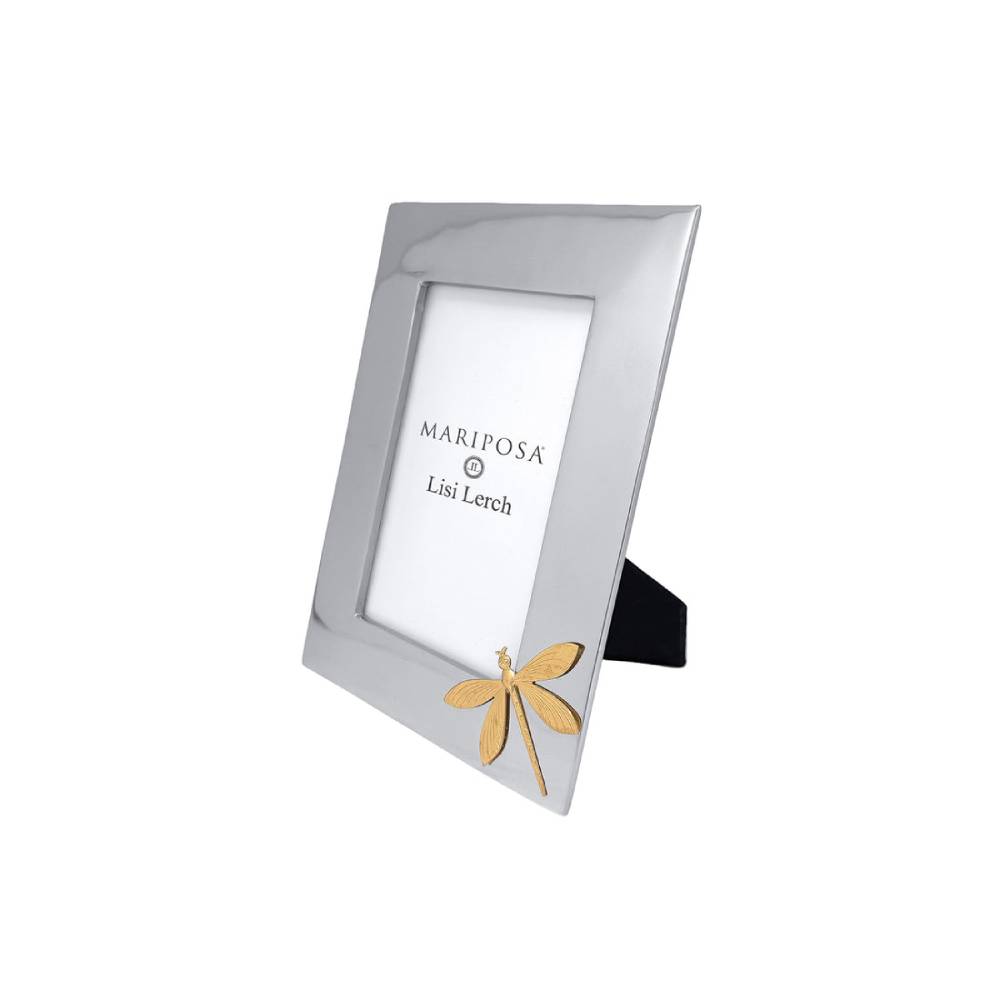 A silver picture frame with a gold dragonfly accent on the bottom right corner, shown standing on a white background with a black support stand visible behind it.