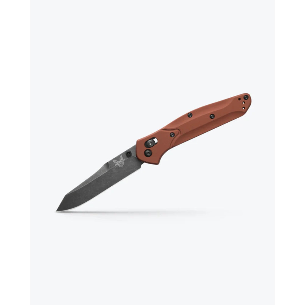 A folding pocket knife with a warm reddish-brown handle, shown open against a clean white background.