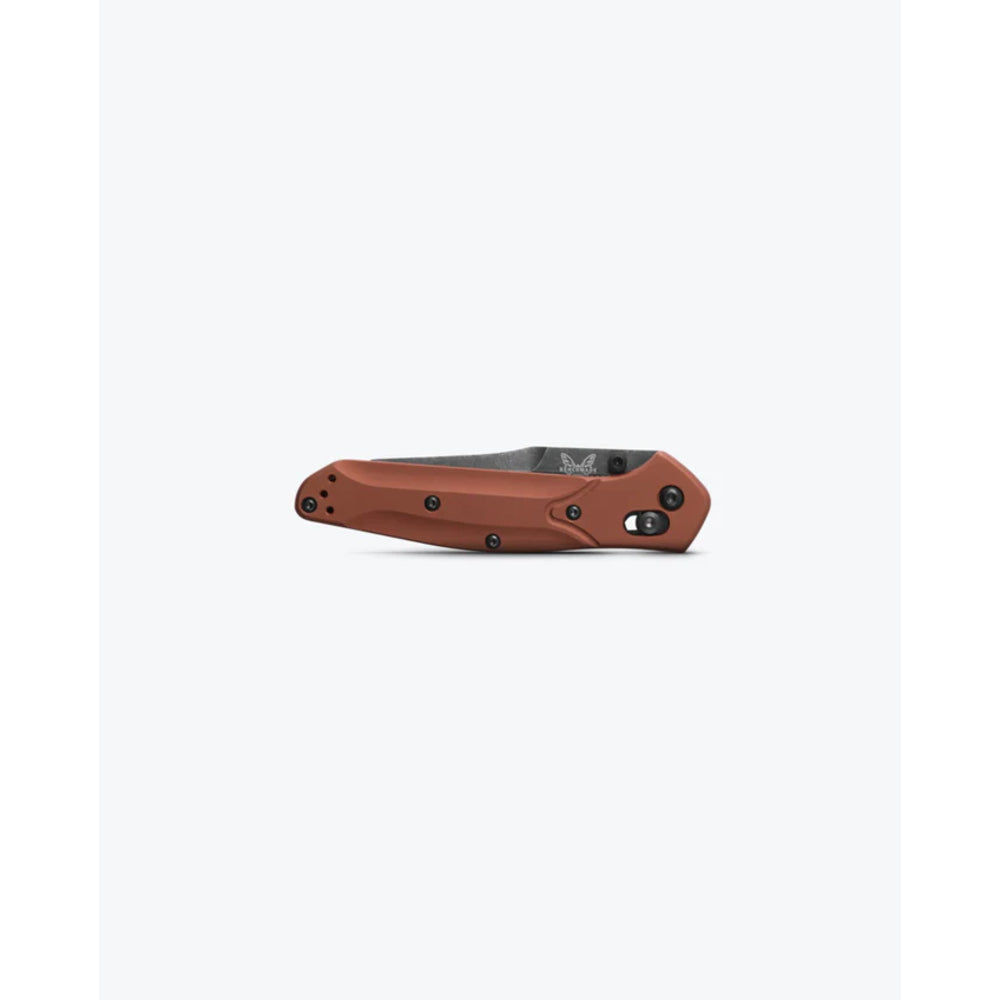 Brown folding knife on a white background
