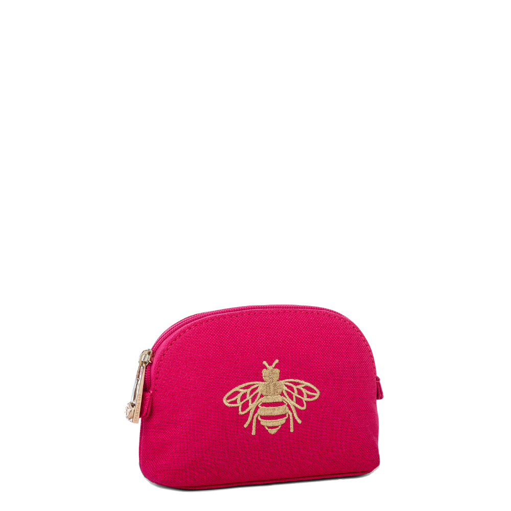Pink makeup case with gold bee