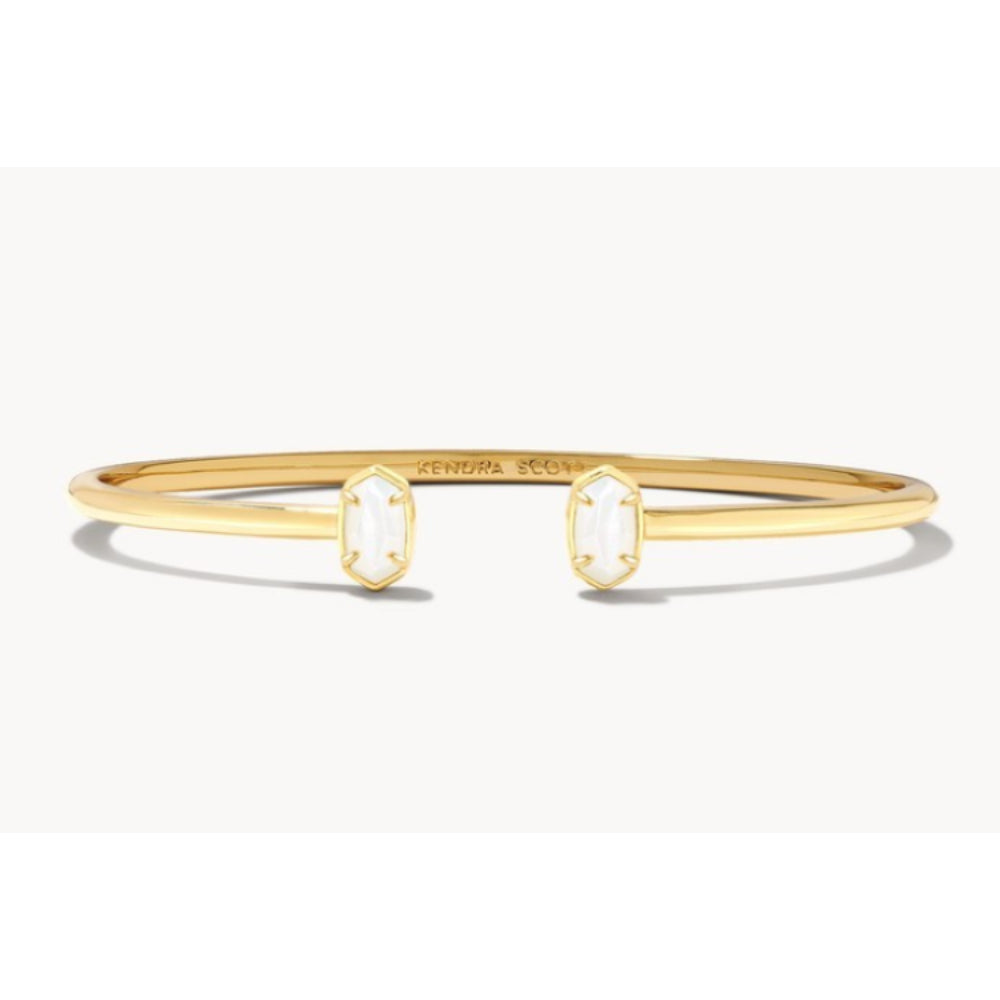 gold and white cuff bracelet
