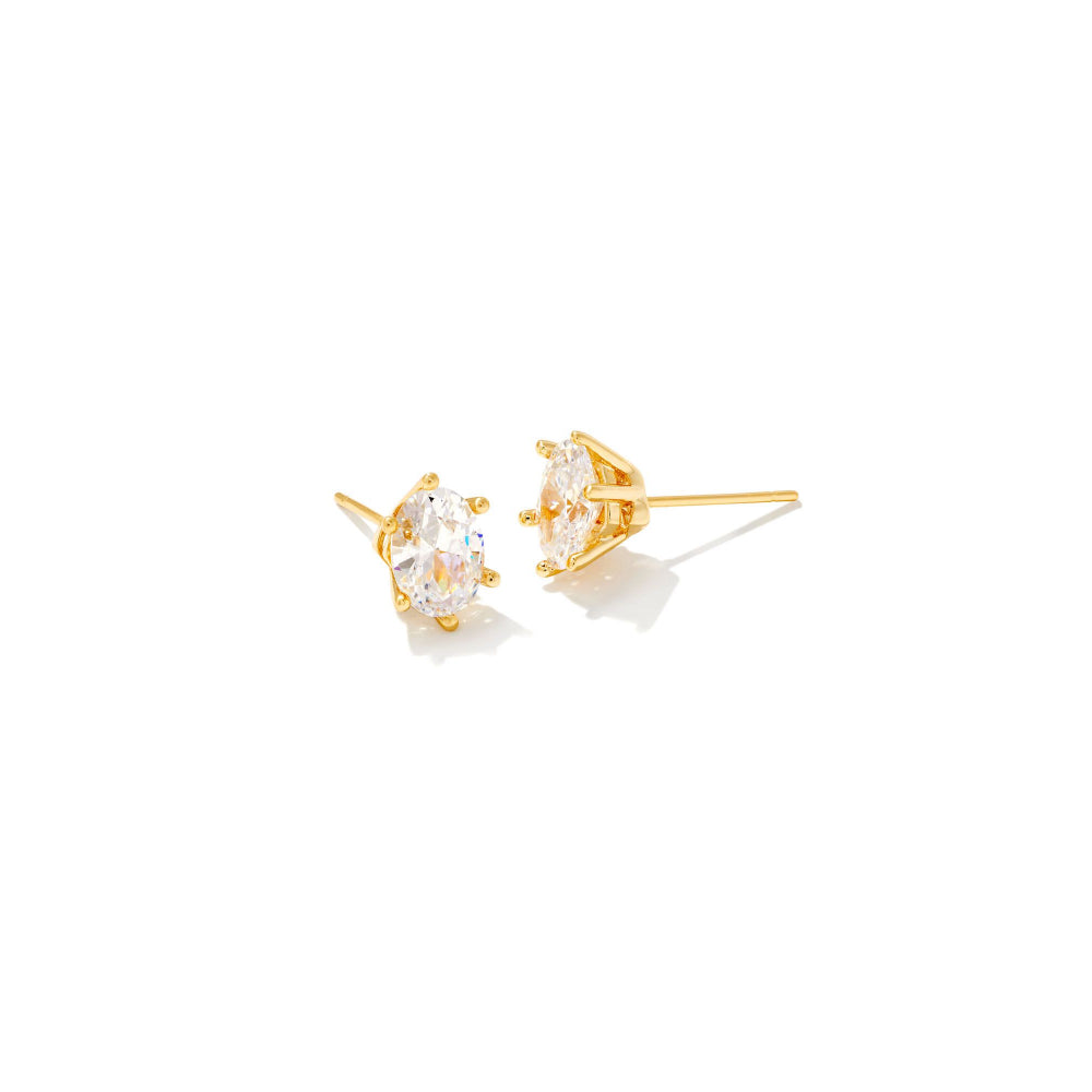 A pair of gold stud earrings with marquise-cut clear gemstones in a prong setting, displayed on a clean white background.