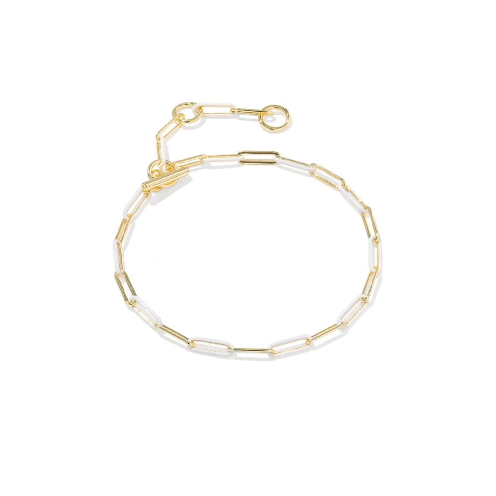 A delicate gold chain bracelet with alternating clear glass and gold metal links, displayed on a clean white background.