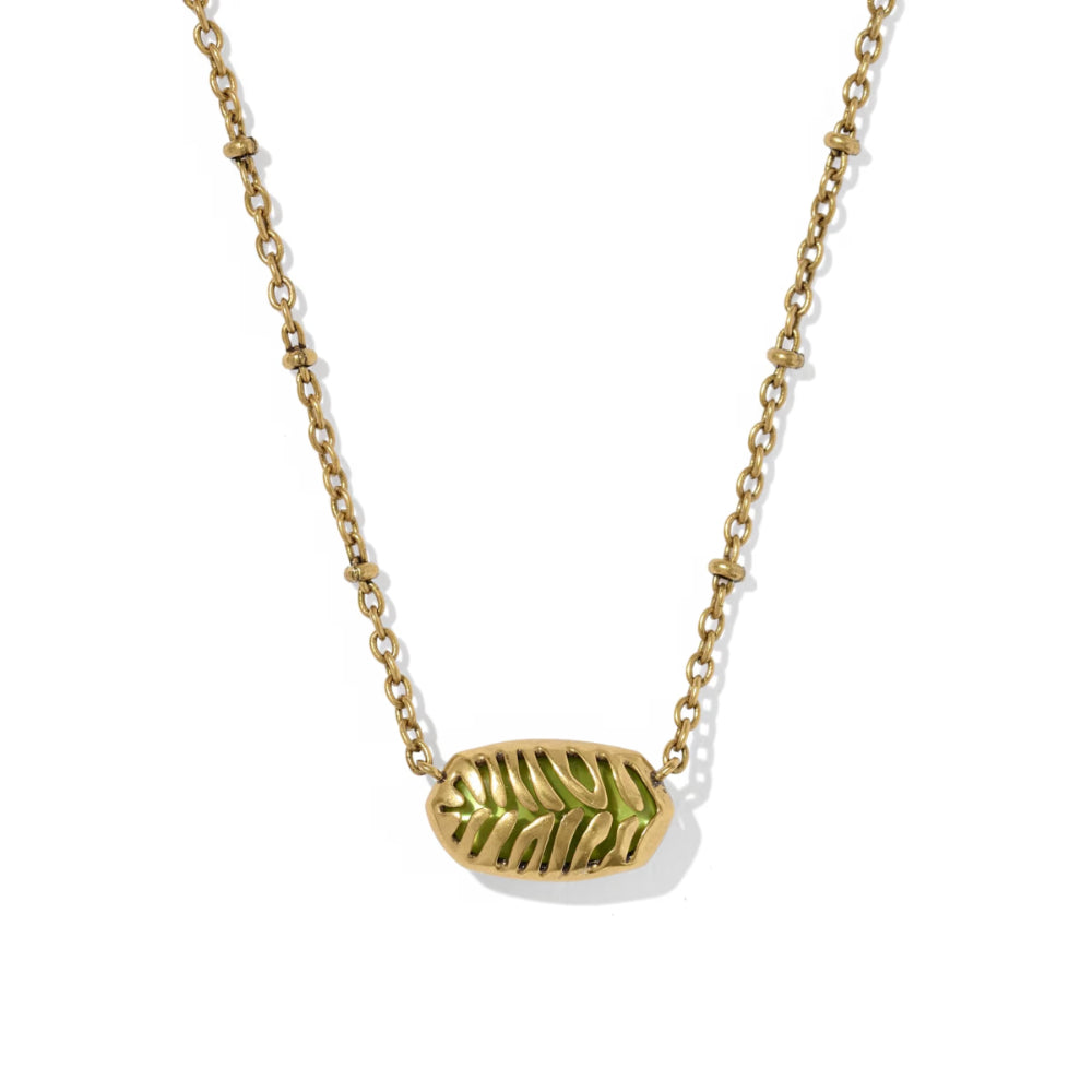 A gold chain necklace featuring an oval pendant with a textured leaf design, shown against a plain white background.