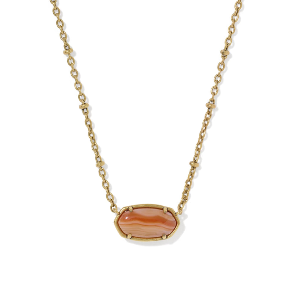 A gold chain necklace featuring an oval pendant with a polished orange and peach banded stone, set in a gold bezel, shown against a plain white background.
