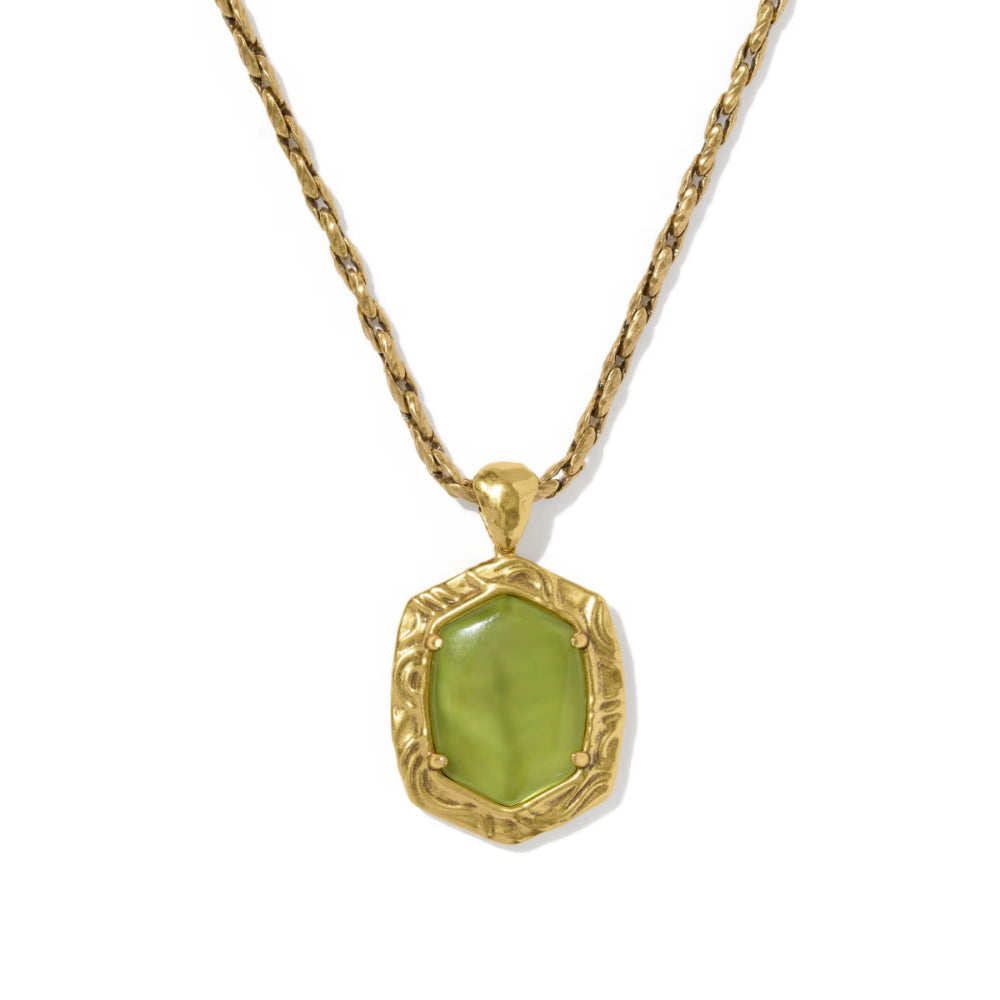 A gold necklace with a textured chain and a hexagonal pendant featuring a green stone in an ornate gold setting, shown against a plain white background.