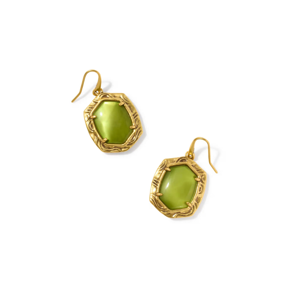 A pair of gold drop earrings featuring textured, shield-shaped gold settings holding smooth olive green cabochon stones, shown on a plain white background.