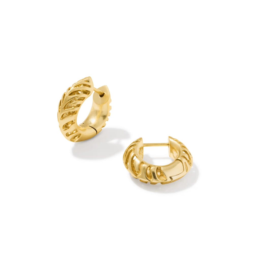 A pair of gold huggie hoop earrings with a textured, ribbed outer band, displayed on a clean white background.