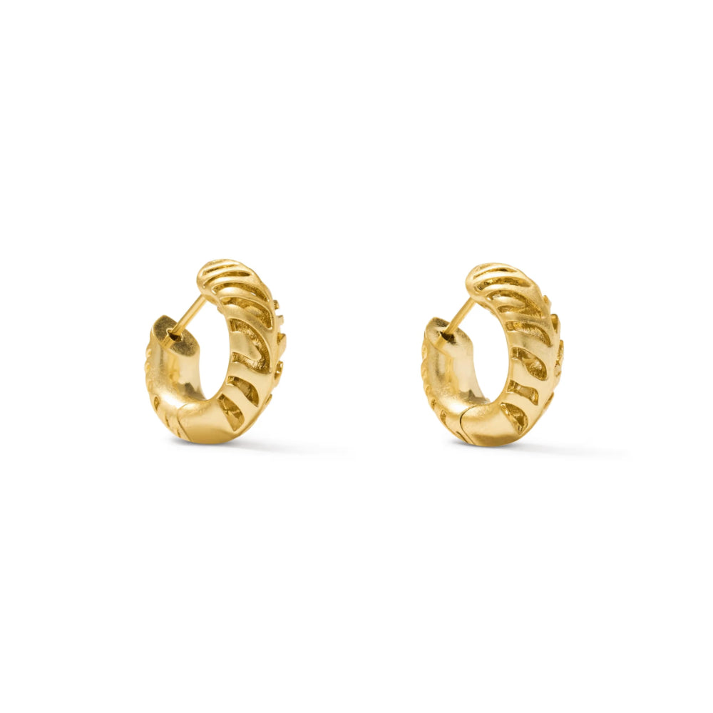 A pair of textured gold huggie hoop earrings with a ribbed, organic surface pattern, shown on a clean white background.