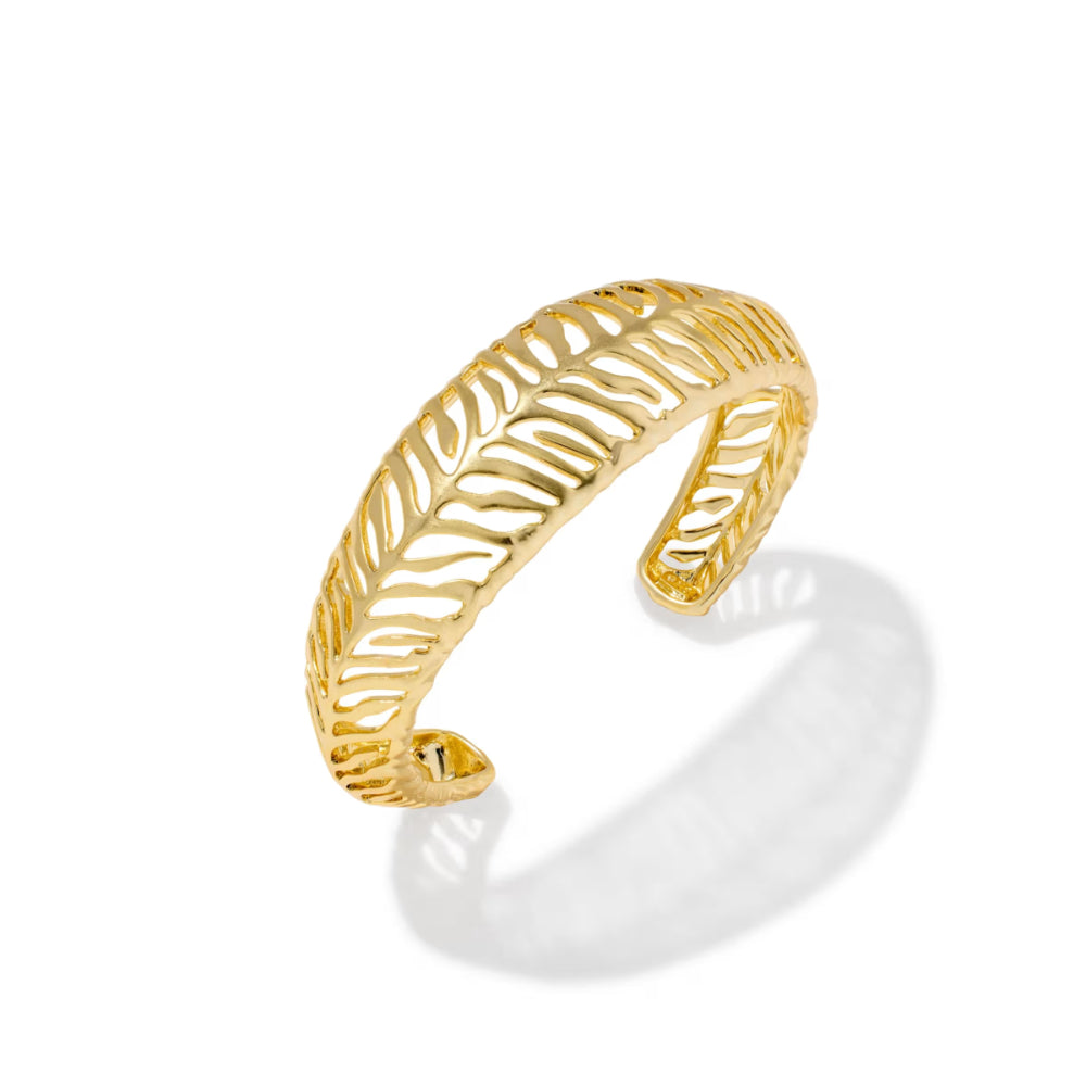 A gold open cuff bangle bracelet with a textured, leaf-like openwork pattern, shown on a white background with a soft shadow.
