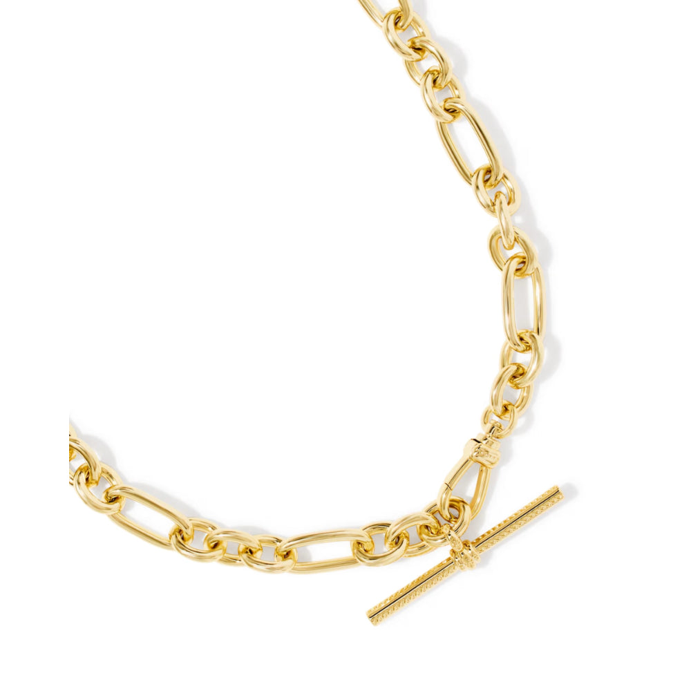 A gold chain necklace featuring a classic Figaro link pattern and a textured toggle clasp, shown on a clean white background.