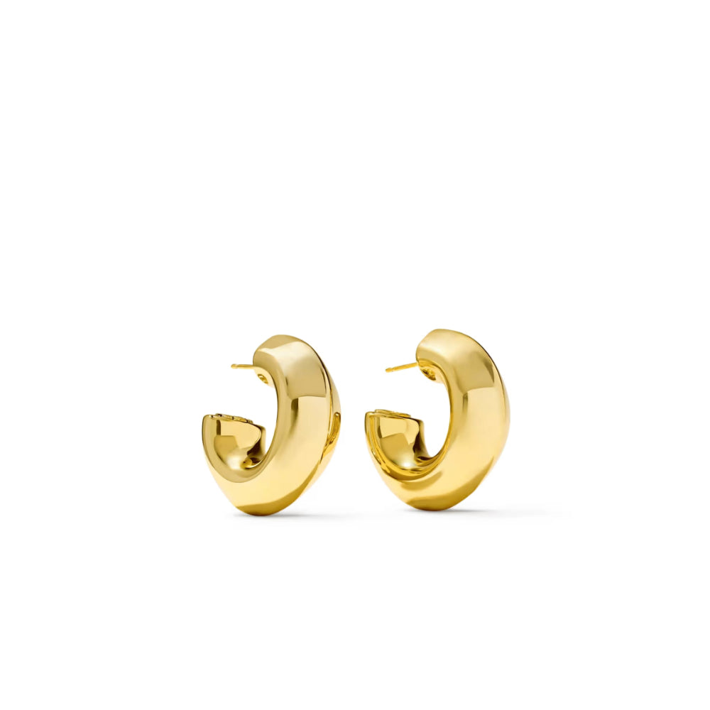 A pair of polished gold huggie hoop earrings on a clean white background.