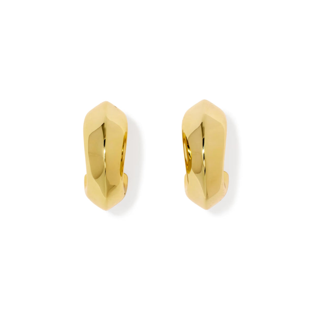 A pair of gold huggie hoop earrings with a faceted, geometric design, shown on a clean white background.