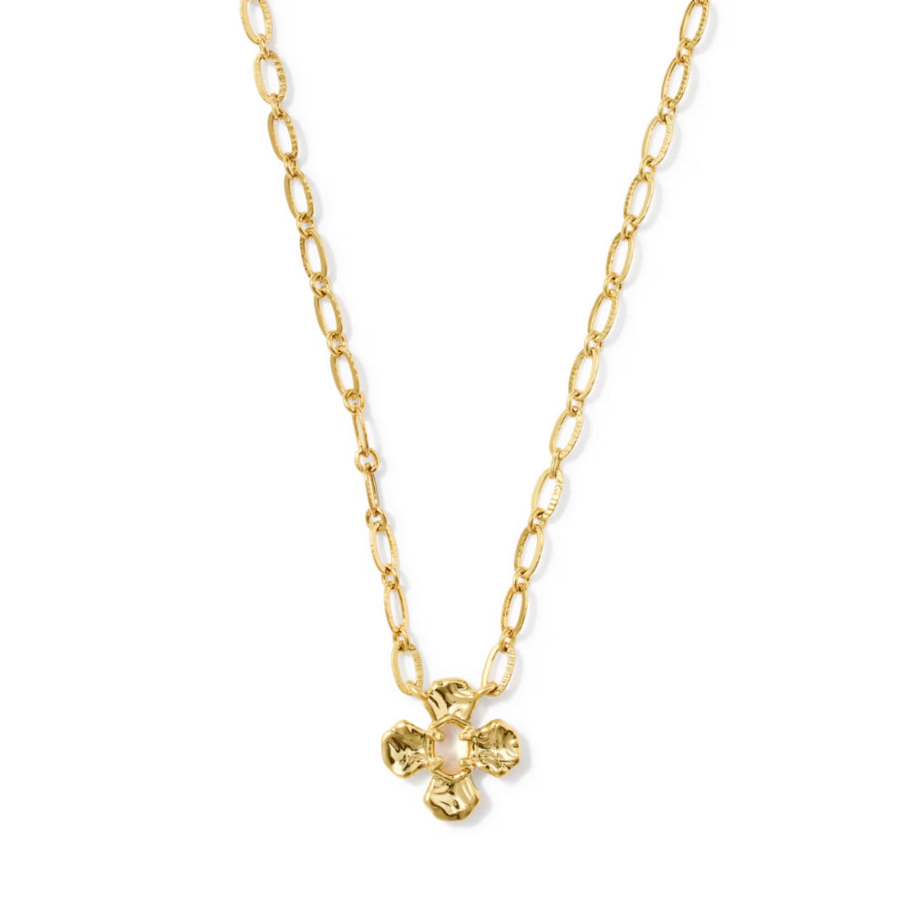 A gold chain necklace featuring a textured, four-petal flower-shaped pendant, shown against a plain white background.