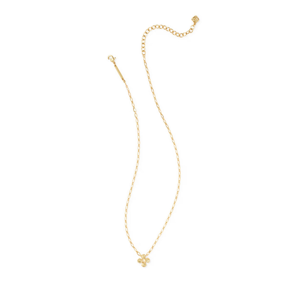 A delicate gold chain necklace with a small clover-shaped pendant, displayed on a clean white background.