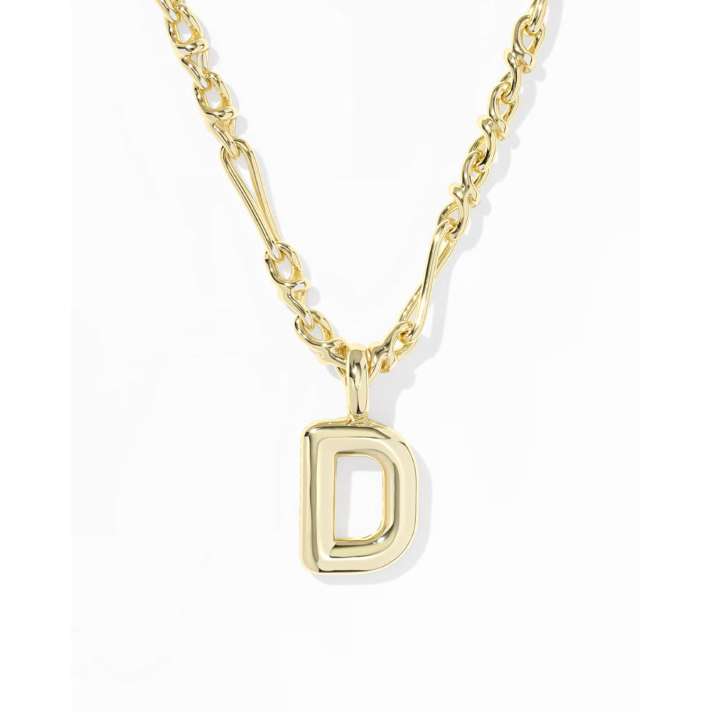 A gold initial necklace featuring a polished open letter 'D' pendant on a matching chain, set against a clean white background.