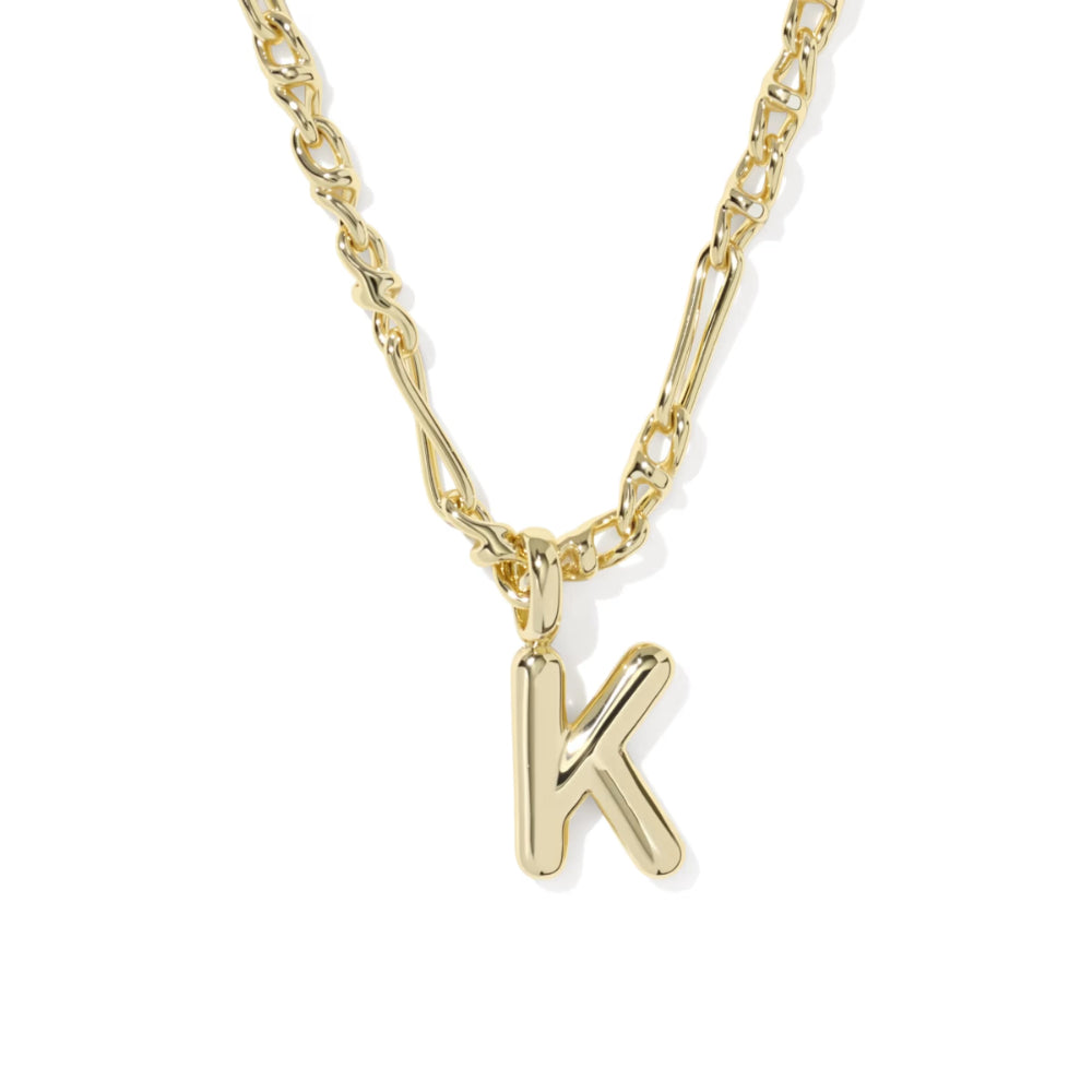 A gold initial necklace featuring a polished letter 'K' pendant on a matching chain, shown against a plain white background.