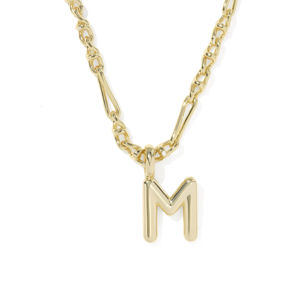 A gold initial necklace featuring a polished letter 'M' pendant on a gold chain, shown against a plain white background.