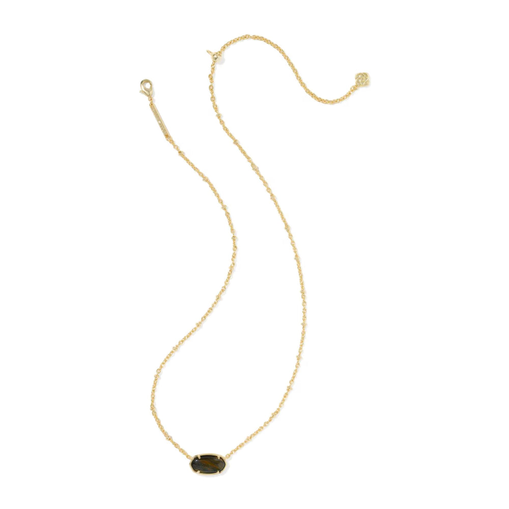 A delicate gold chain necklace featuring a small, dark oval stone pendant, displayed against a solid white background.