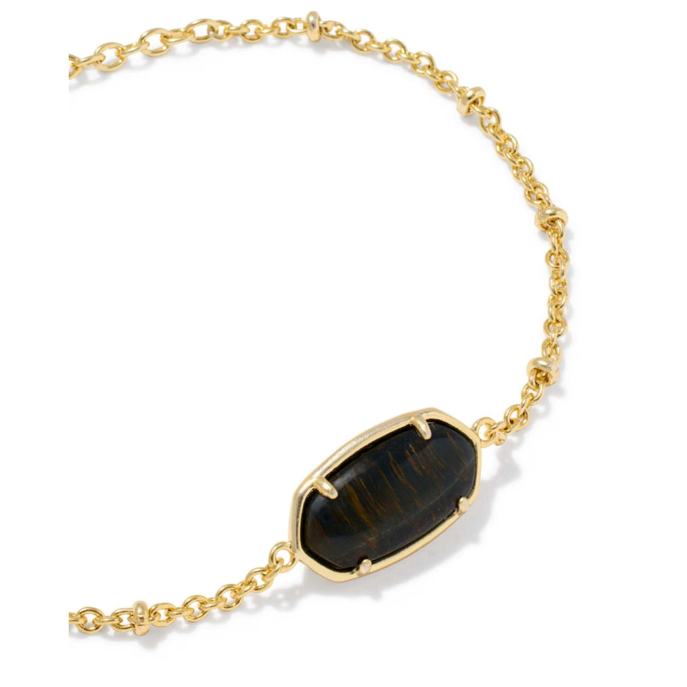 A gold chain necklace featuring a central elongated oval pendant with a dark brown and black tiger's eye stone, set in a polished gold bezel, on a white background.