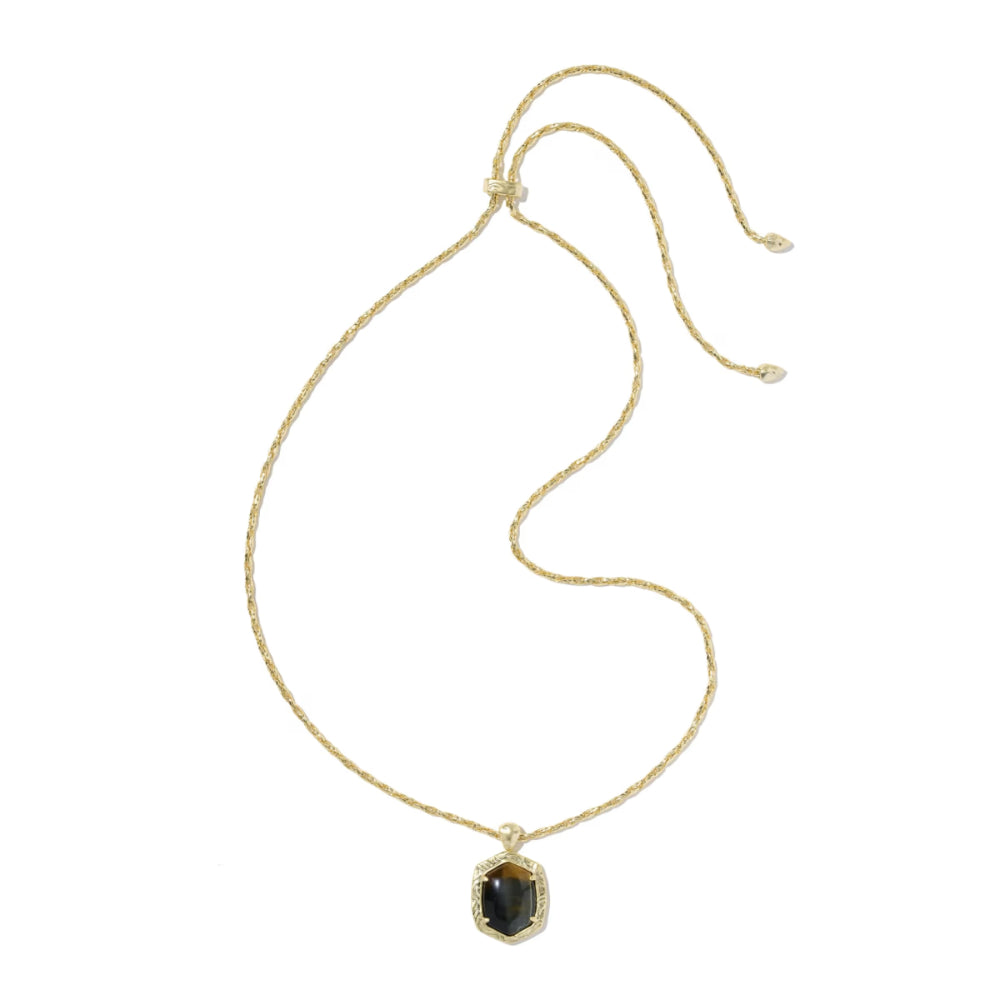 A delicate gold chain necklace with a small hexagonal dark green gemstone pendant, displayed on a clean white background.