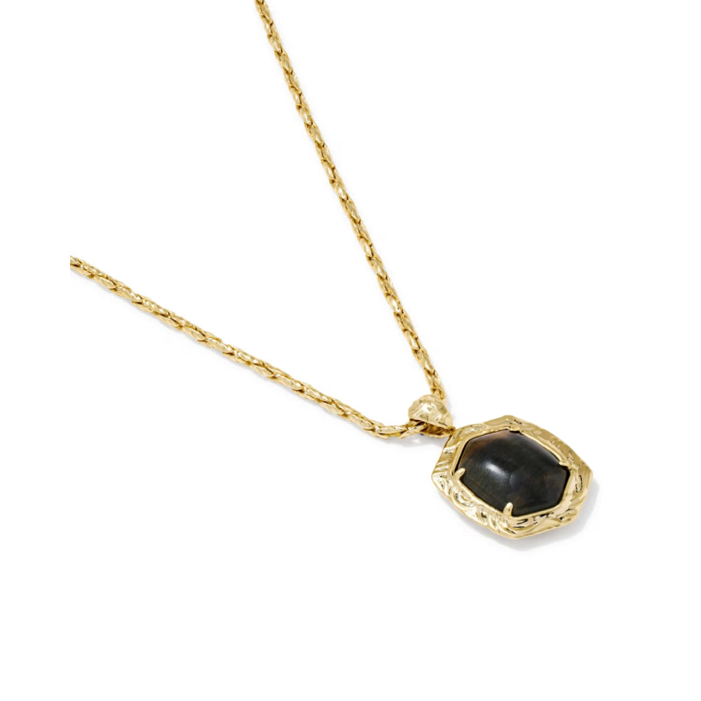 A gold chain necklace with a textured gold bezel holding a dark, polished black stone pendant, shown on a plain white background.