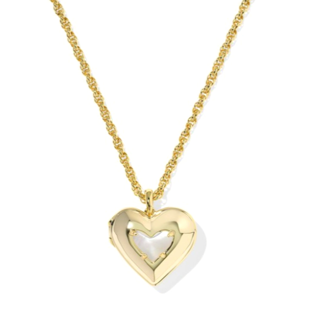 Gold heart locket necklace with a mother of pearl heart center on a white background