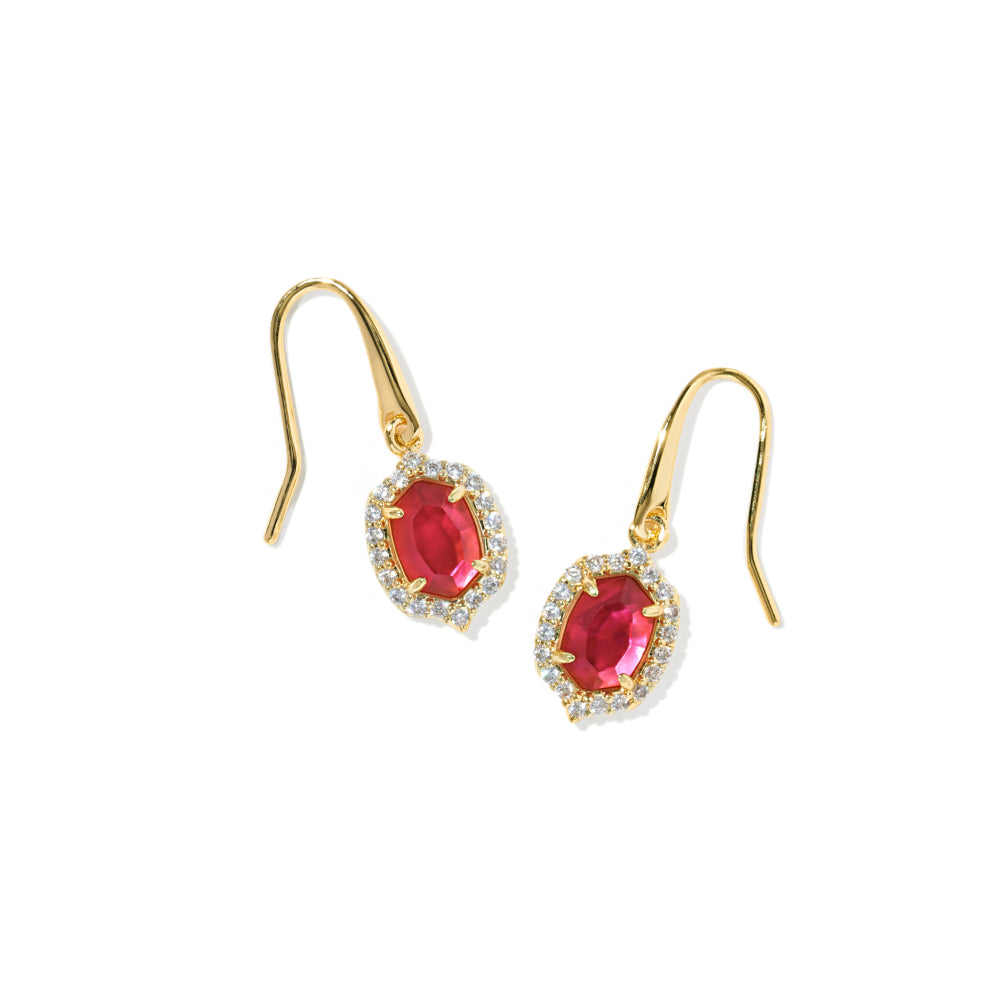 A pair of gold drop earrings featuring oval-cut pinkish-red center stones surrounded by small clear stones, shown on a plain white background.