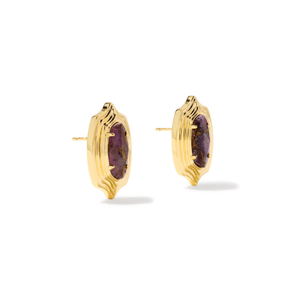 A pair of gold stud earrings with textured, scalloped bezel settings holding oval purple gemstones, shown on a clean white background.