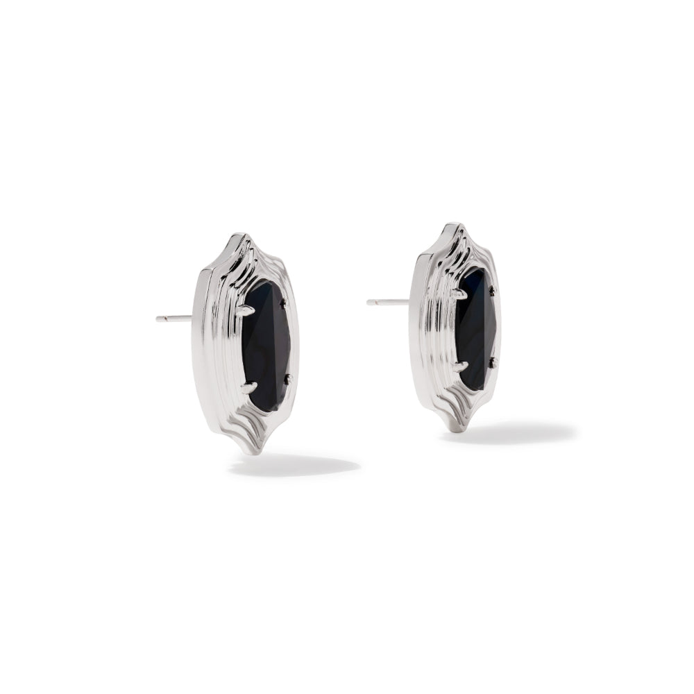 Pair of silver spiral earrings on a white background