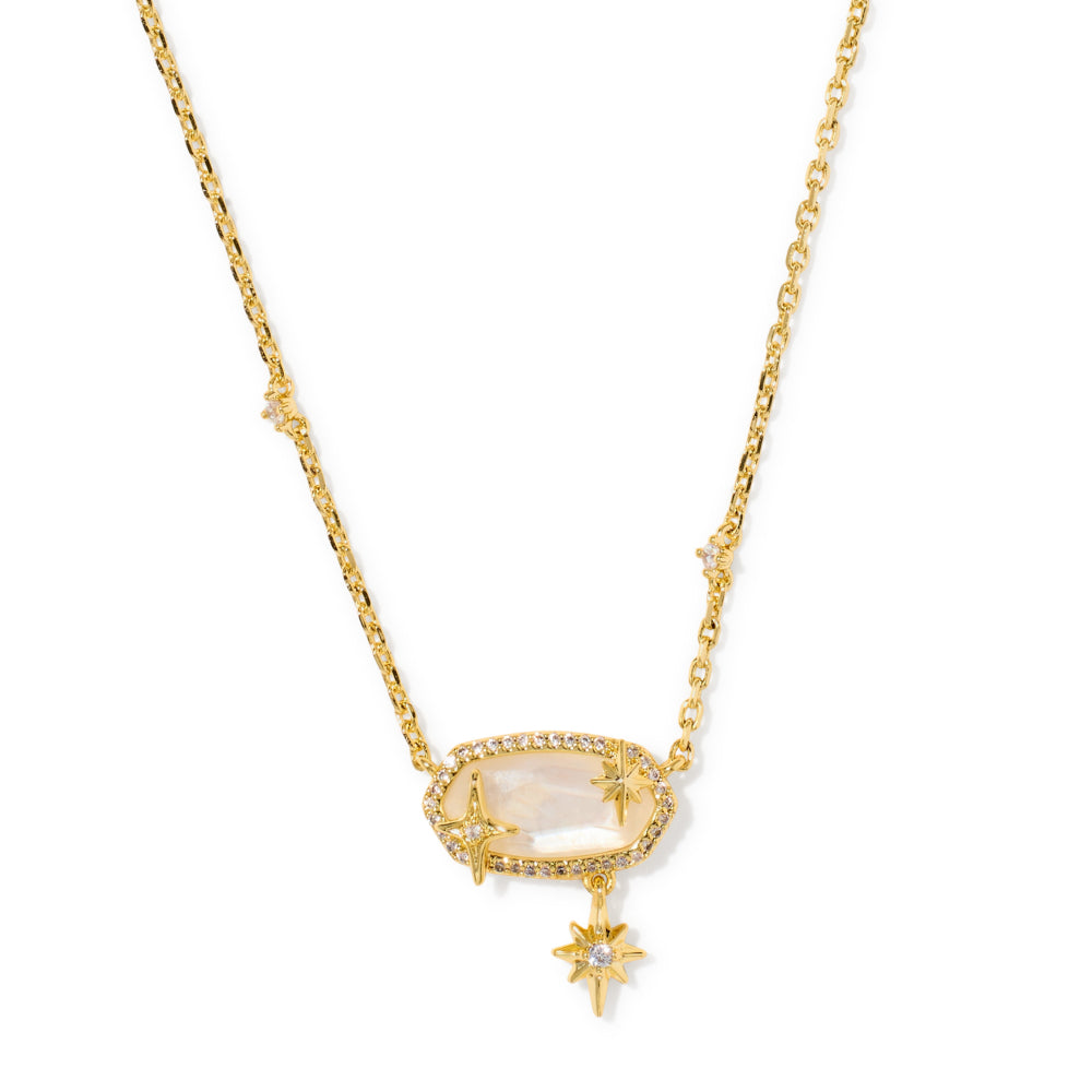 A gold chain necklace featuring a central oval halo pendant with a pale pink stone and small clear stones, accented by two dangling gold starburst charms, shown on a plain white background.