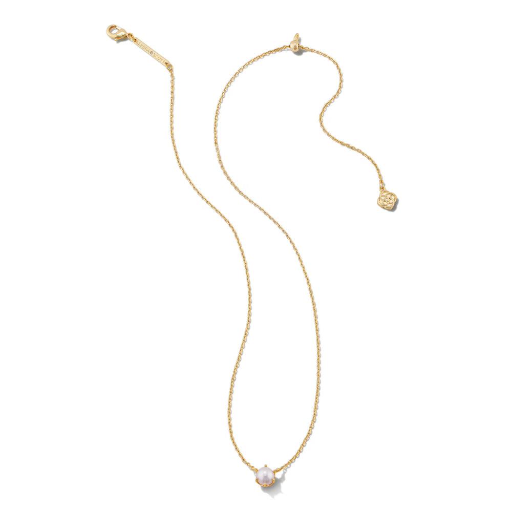 A delicate gold chain necklace featuring a small, round, pale pink pearl pendant, displayed on a clean white background.