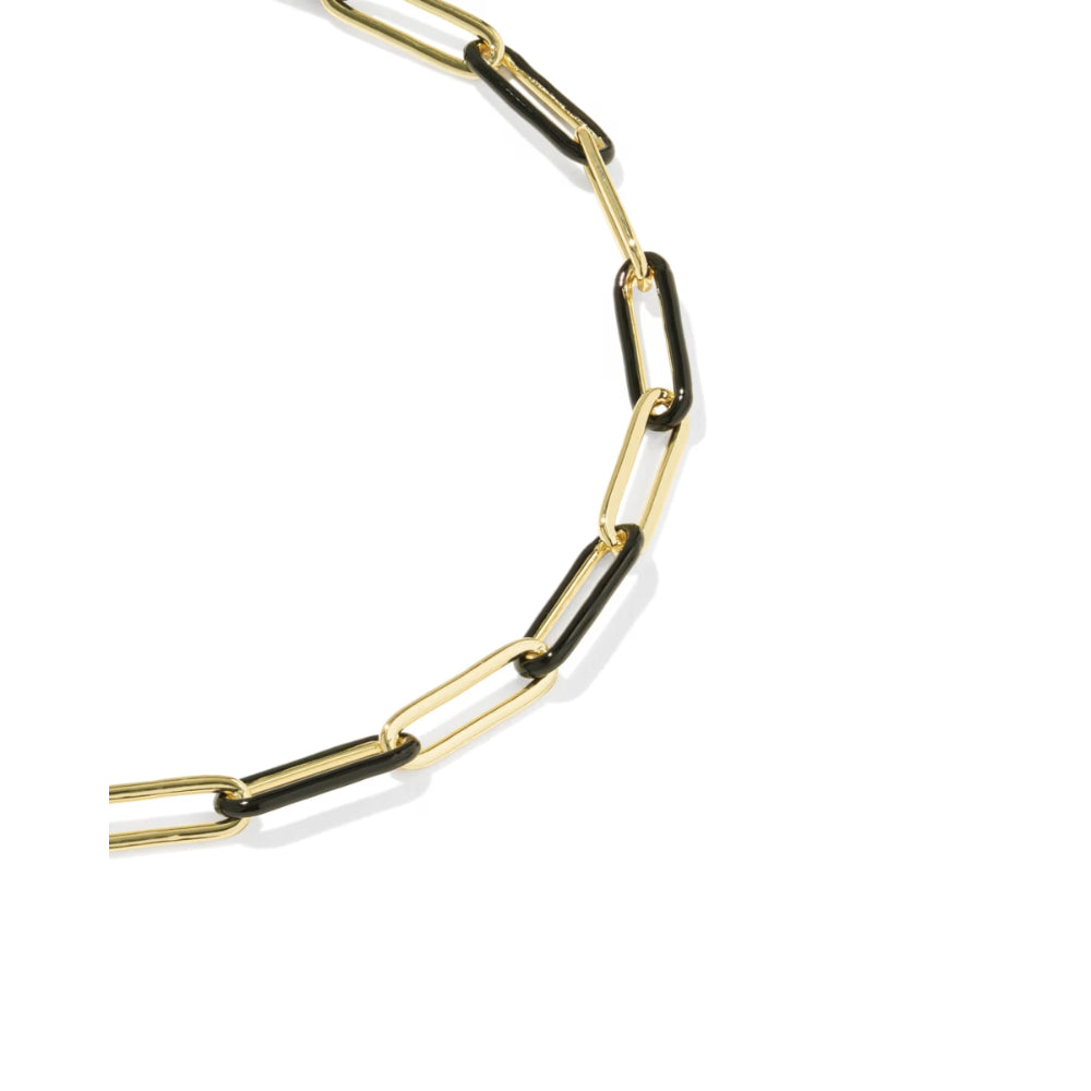 A gold paperclip chain necklace with alternating gold and black links, shown on a clean white background.