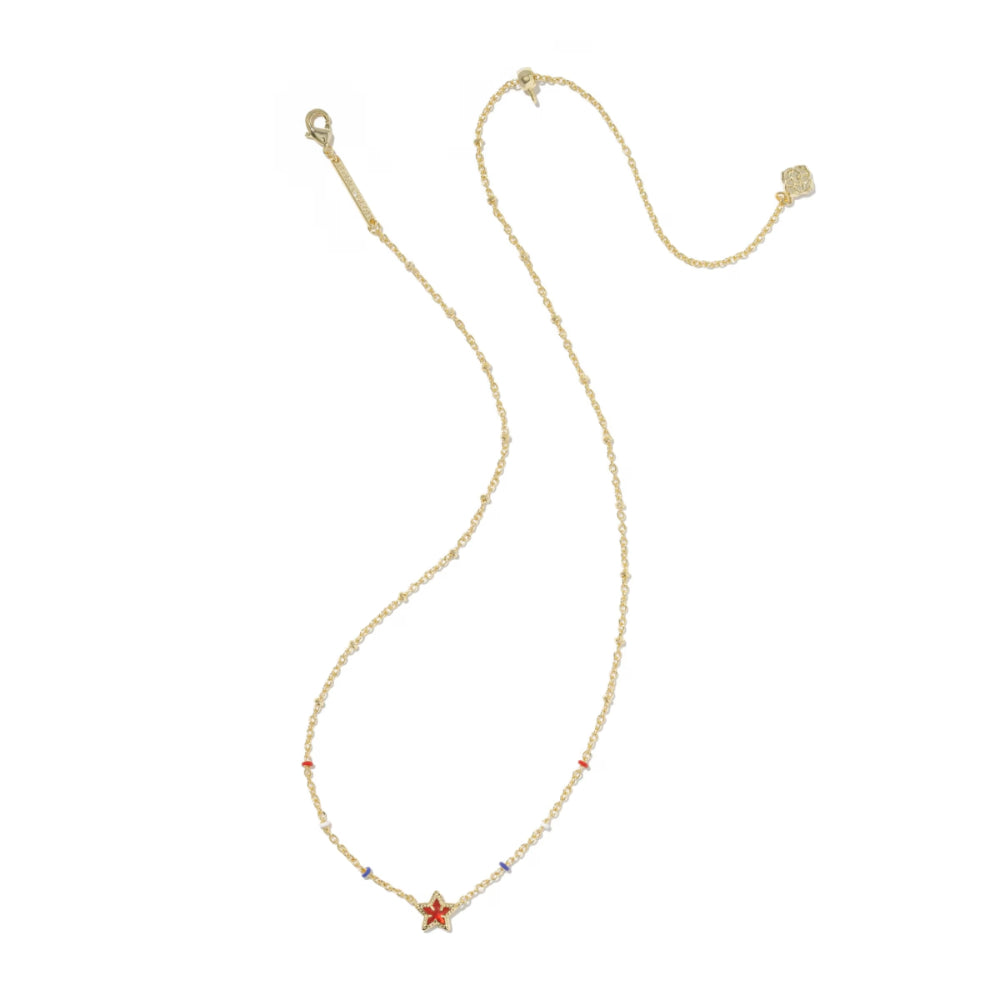 Gold necklace with small star-shaped pendant on a white background
