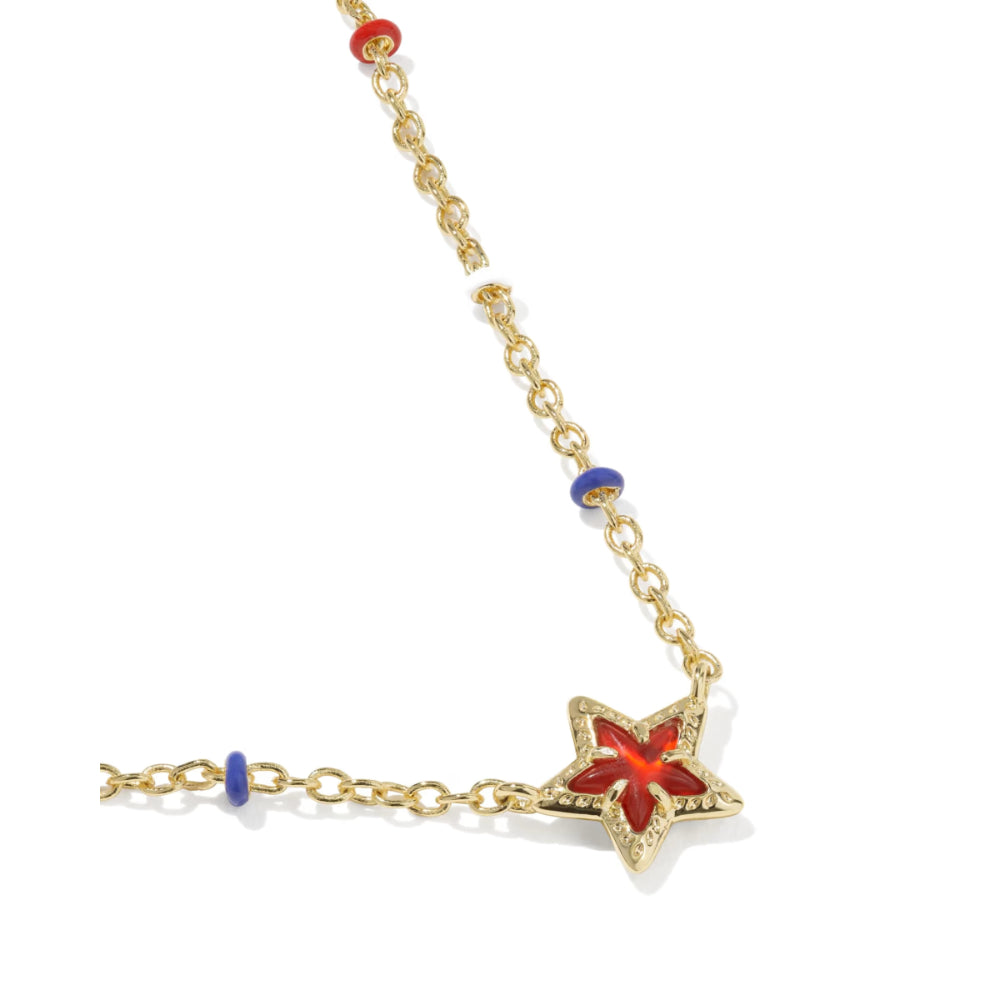 Gold NECKLACE with a red star charm on a white background