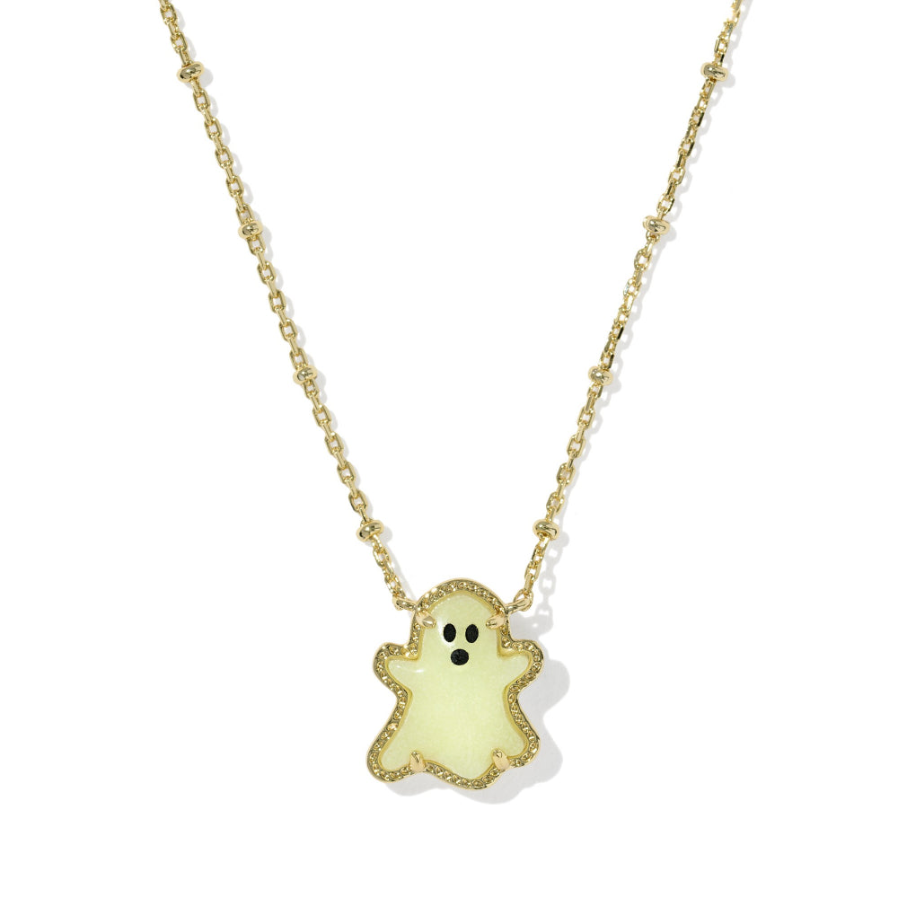 A gold chain necklace featuring a cute ghost-shaped pendant with a pale yellow-green body, black eyes, and a textured gold border, shown on a clean white background.