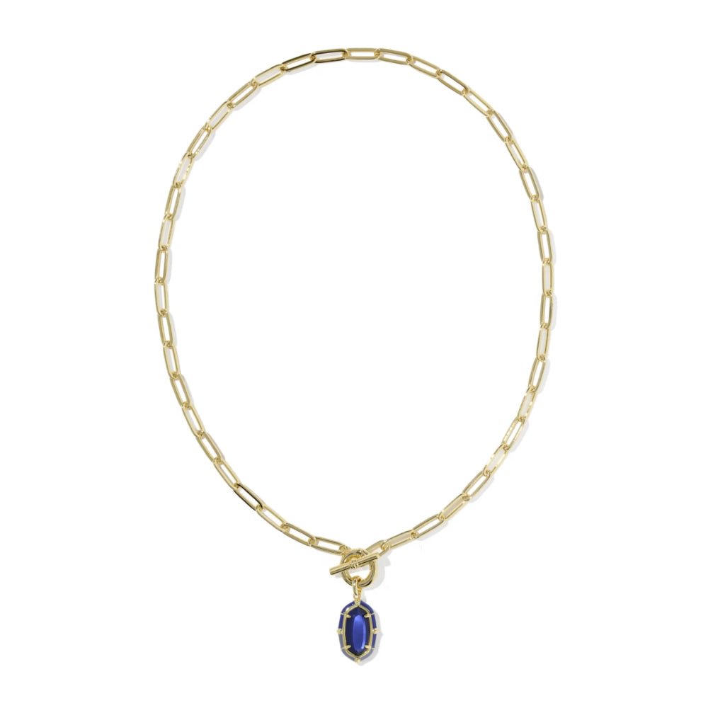 A gold paperclip chain necklace with a toggle clasp and a small oval blue gemstone pendant, shown on a plain white background.
